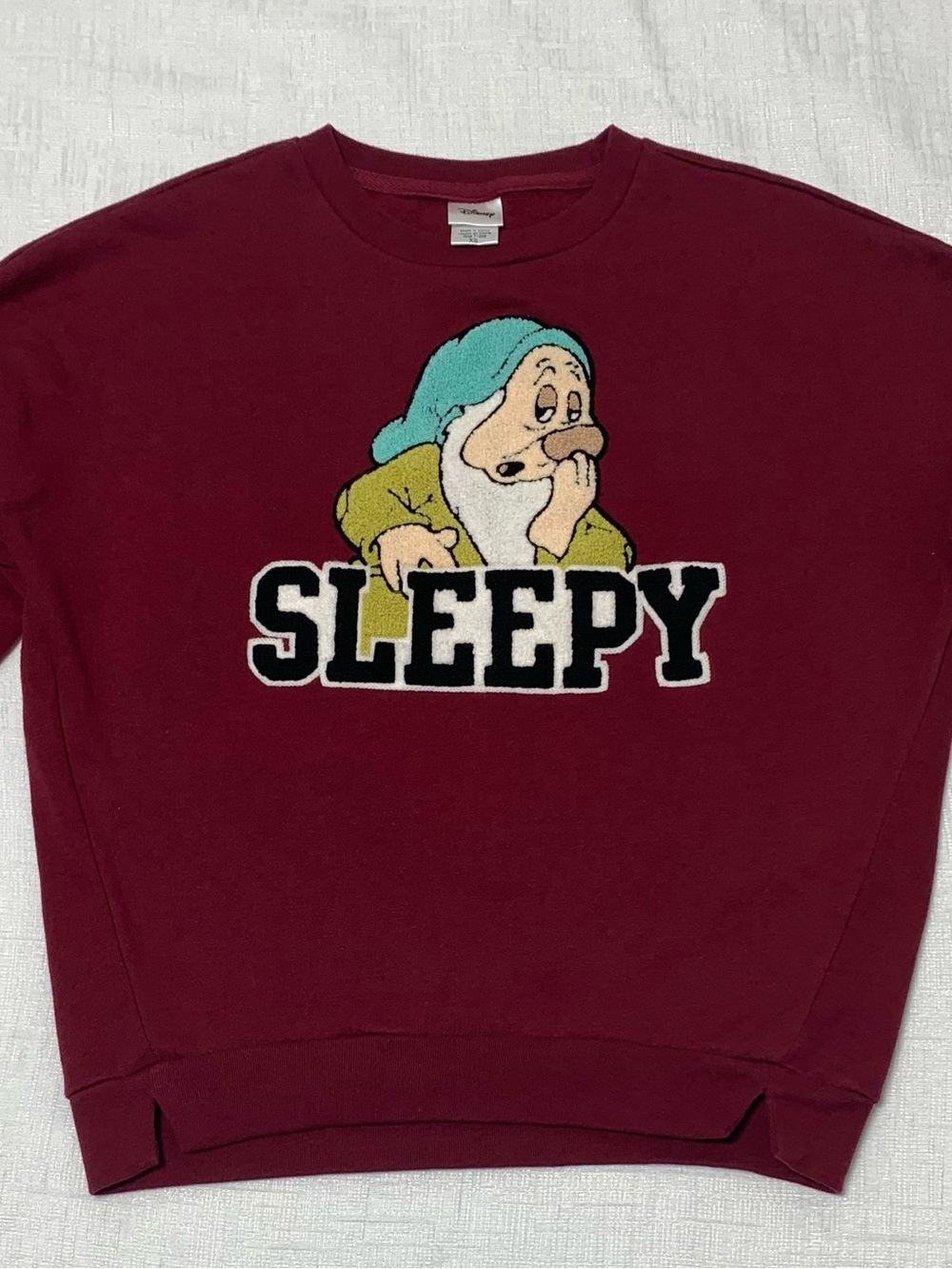Disney Women's Burgundy Crewneck Sweater with Sleepy Graphic